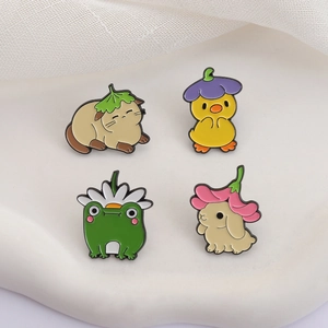 Set of 4 cute enamel animal brooches featuring a cat, duck, frog and rabbit on white tray