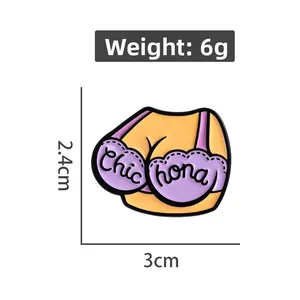 Detail showing female torso enamel pin size 3x2.4cm and 6g weight on white background