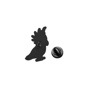 Detail view of the black metal back and rubber clutch for cartoon parrot brooch pin