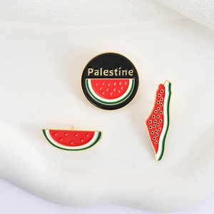 Three-piece watermelon enamel pin set with Palestine text on polished metal badge