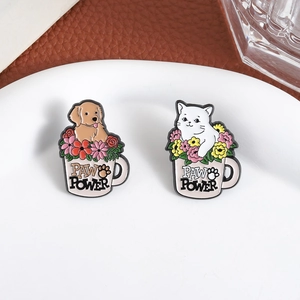 Enamel lapel pins featuring cute cat and dog in flower cups with Paw Power text
