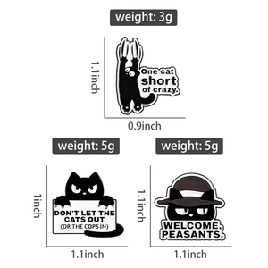 Detailed view of black cat enamel pins with funny captions and precise size measurements