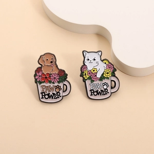 Set of 2 cute cartoon enamel pins with cat and dog in flower cups with PAW POWER text
