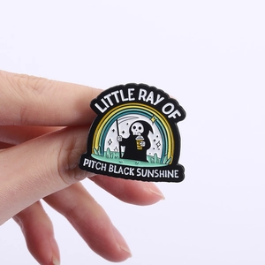 Grim Reaper enamel pin holding coffee with rainbow and Pitch Black Sunshine text