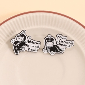 Cat Parade enamel pins featuring Meow Chemical Romance band design in black and white