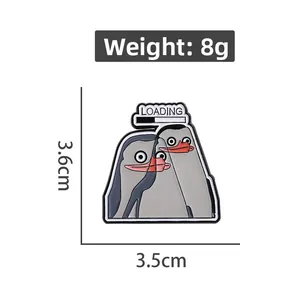 Detail showing dimensions of loading penguin enamel pin with 3.6cm height and 8g weight