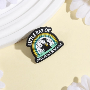 LITTLE RAY OF PITCH BLACK SUNSHINE reaper enamel pin with rainbow and scythe
