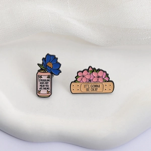 Lot de pins émaillés avec pansement fleuri et canette aux citations motivantes