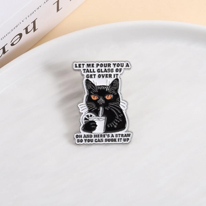 Funny black cat enamel pin with cocktail glass and humorous quote on white background
