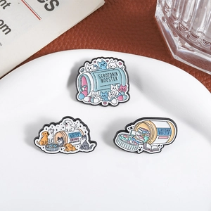 Three-piece enamel pin set with cat, dog, and book themes labeled Serotonin Booster
