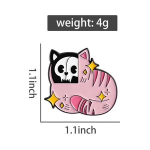 Detailed view of pink striped cat skull enamel pin showing 1.1x1.1 inch dimensions