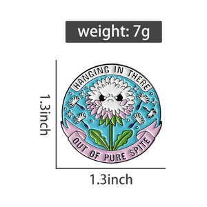 Detail view of round enamel pin showing sizes 1.3 inch and 7g weight with sharp edges