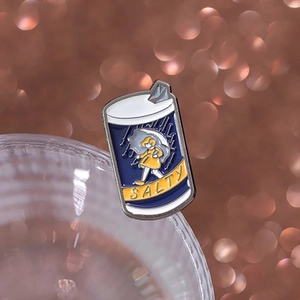 Cute enamel pin featuring a girl with an umbrella and salty text on blue badge