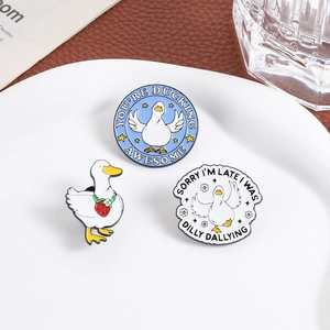 Three-piece set of funny duck enamel pins with humorous quotes and strawberry charm detail