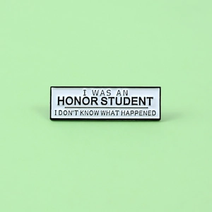 Honor student rectangle enamel pin with humorous text on a clean mint background