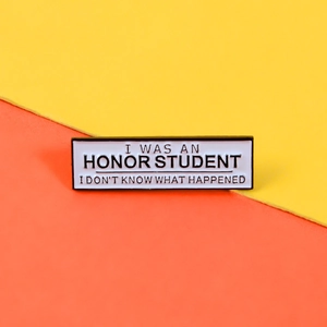 Funny enamel honor student quote brooch pin in minimalist black and white design
