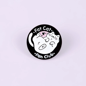 Cute Fat Cat Fan Club enamel pin featuring two white kittens on black round badge