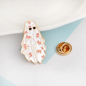 Ghost enamel pin with black sunglasses and pink floral patterns on white background