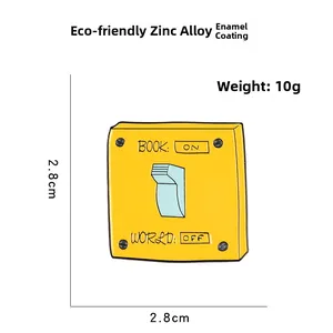 Cartoon switch enamel pin with 'Book On World Off' text, yellow alloy badge 2.8x2.8cm