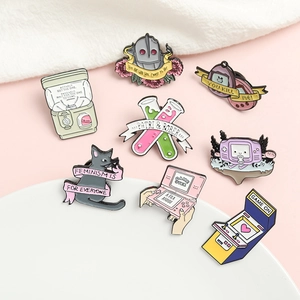 Creative alloy enamel pin set featuring cartoon game consoles and colorful badges
