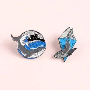 Cartoon whale enamel pins set featuring round and diamond shapes with ocean wave designs