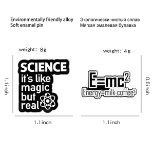 Science and physics soft enamel pins featuring E=mc2 and magic quote on white background