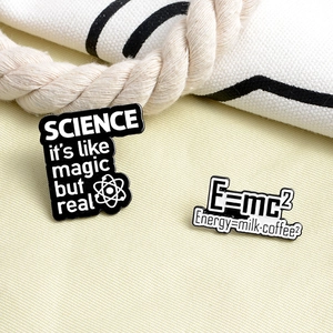 Science enamel pins with physics humor and milk coffee energy equation design