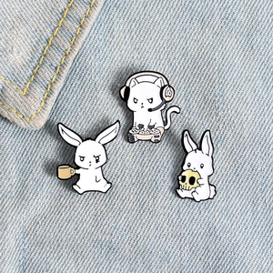 Creative cartoon enamel pin set featuring game console cat, coffee rabbit and skull rabbit