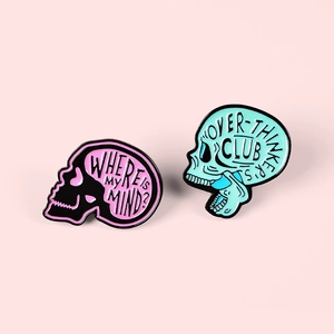 Punk style colorful skull enamel pins featuring creative slogan lettering and metal finish