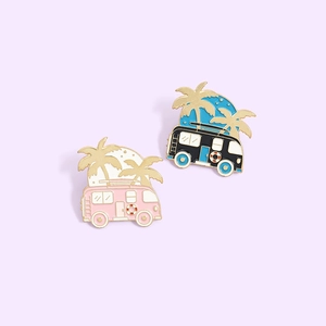 Retro camper van enamel pins with palm trees in pink and black on purple background