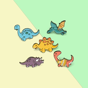 Detailed view of colorful cartoon dinosaur enamel pins set made of zinc alloy lacquer