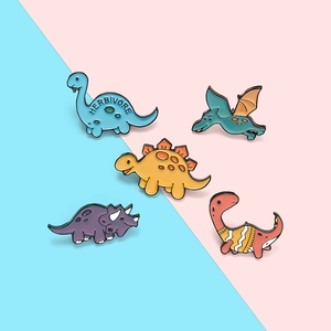 Set of five colorful dinosaur enamel pins including herbivore brontosaurus and pterosaur