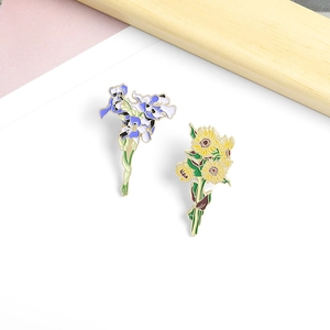 Artistic Van Gogh inspired enamel brooches featuring sunflower and iris floral designs