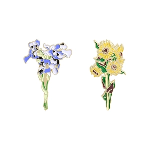 Enamel brooch set featuring Van Gogh's iris and sunflower patterns with golden metal edges
