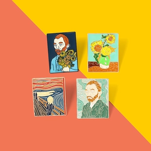 Artistic enamel pins set featuring Van Gogh Sunflowers and The Scream on orange background
