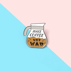 Detail of MAKE COFFEE NOT WAR enamel pin with glass kettle design on pink and blue background