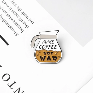 Make Coffee Not War enamel pin with a black coffee pot design and bold white lettering