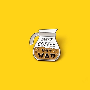 Creative coffee pot enamel pin featuring Make Coffee Not War slogan on yellow background