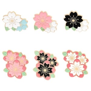 Exquisite cherry blossom enamel pins set in various pink and white floral styles