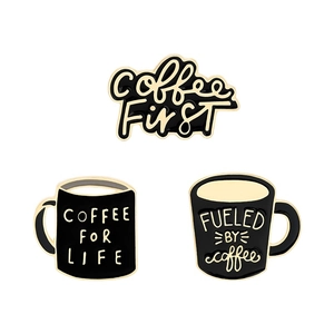 Three-piece set of black enamel coffee pins with gold edges and coffee slogans