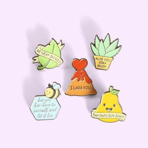 Cute enamel pin set featuring cartoon pear, volcano, aloe, and honeycomb motifs