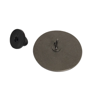 Round alloy badge pin back view featuring secure needle and black rubber clutch backings
