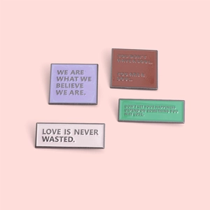 Minimalist alloy enamel letter pins featuring inspirational quotes in four pastel colors