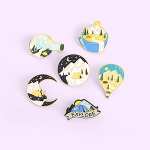 Set of 6 cartoon mountain enamel pins featuring outdoor camping landscapes on purple background