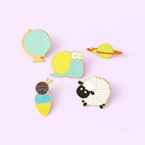 Set of 5 creative cartoon enamel pins featuring yarn ball animal and planet designs
