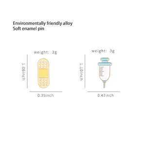 Syringe and adhesive bandage soft enamel pins in eco-friendly alloy with size details