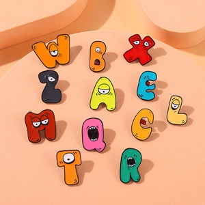Cartoon alphabet lore enamel pin set with colorful 26 letters on pink display stands