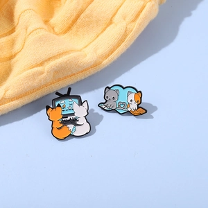 Close-up of cute cartoon fox enamel pins and pixel art game badges on purple background