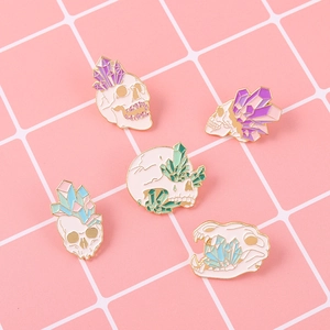 Set of 5 punk style skull and crystal enamel pins with vibrant gradient colors