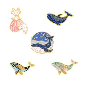 Five-piece ocean set with cute cat and whale enamel pins featuring artistic nautical motifs